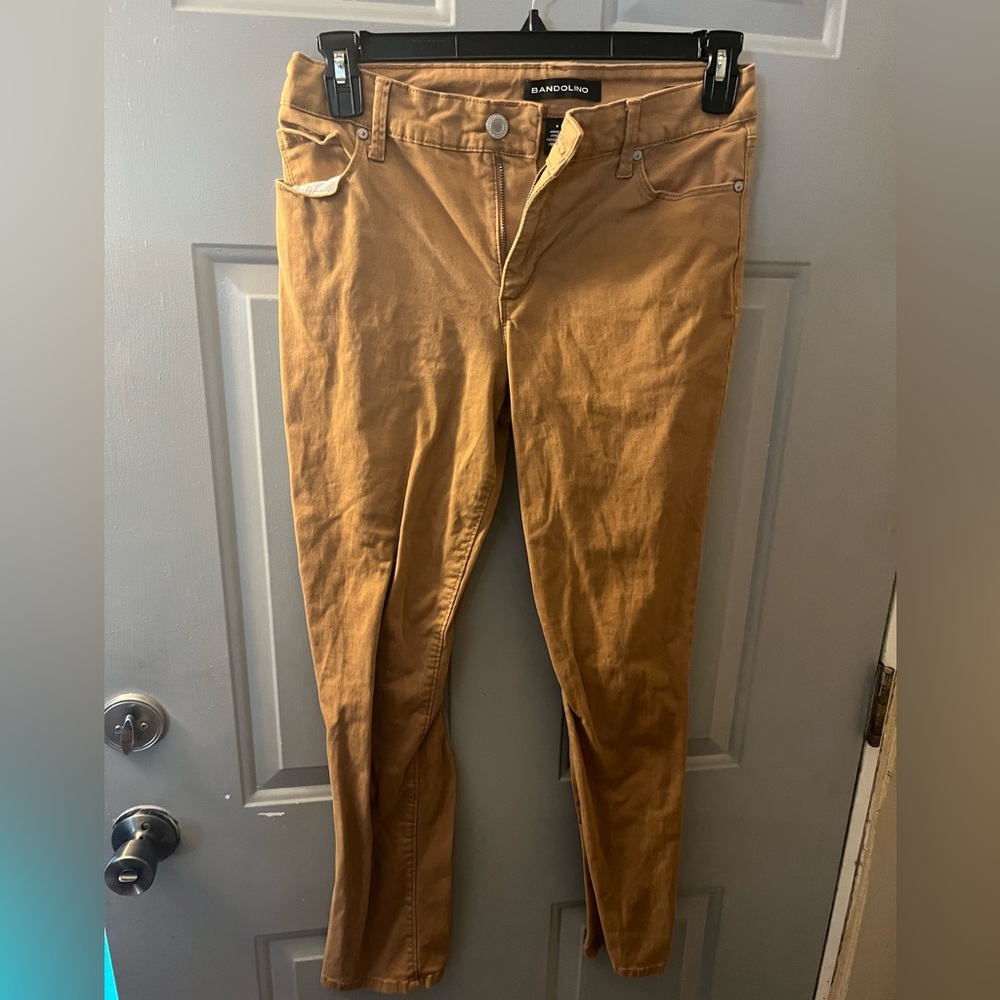 Size 6 skinny jeans. Camel color.